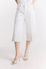 PANTALONE CROP CON BORCHIE