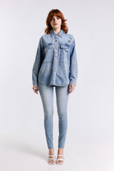 JEANS SKINNY CON BORCHIE ARGENTO