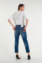 Jeans cropped blu con effetto used e dettagli paint